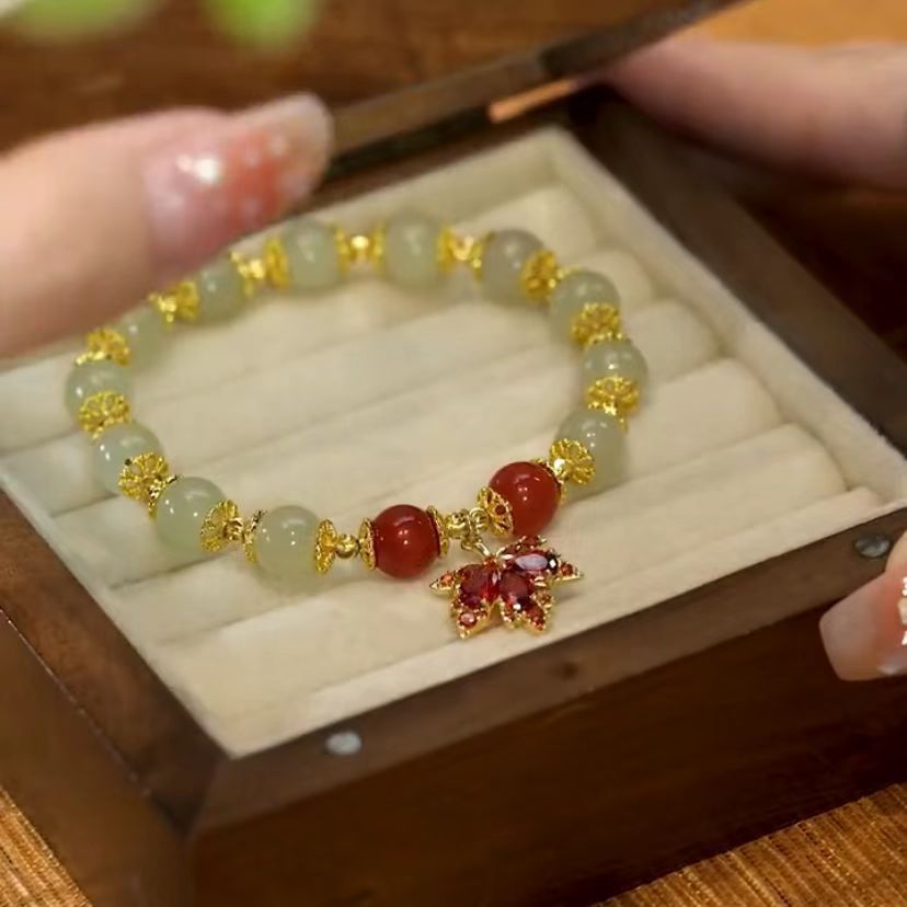 šš Hetianas nefrÄ«ta rokassprÄdze ar zelta lapas rotÄjumu