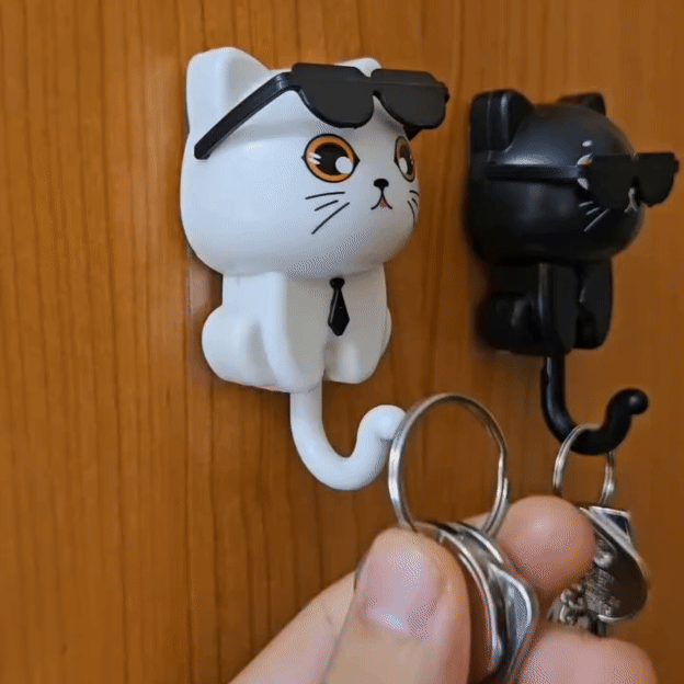 🕶️ Animēto filmu kaķa atslēgu piekariņš